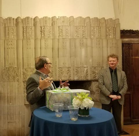 Jeff Alexander presenting Phil Smith with a gift from his Sociology Department colleagues