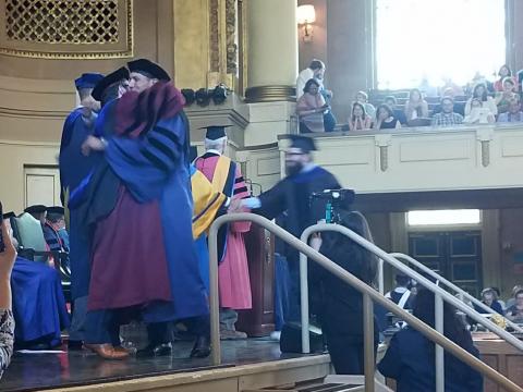 Michael Sierra-Arevalo and Samuel Stabler receiving degrees
