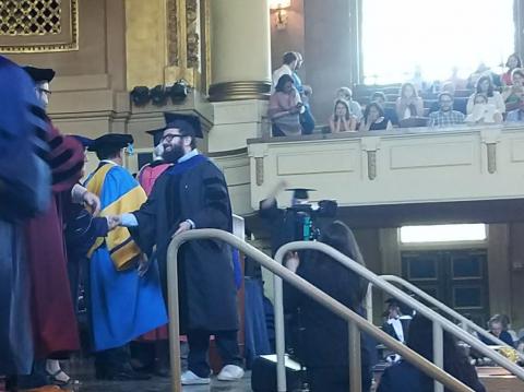 Samuel Stabler receiving his degree