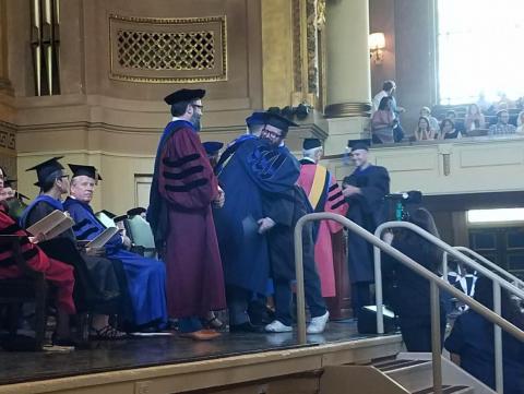 Samuel Stabler and Luke Wagner receiving degrees